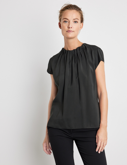 Blouse top with a gathered neckline in Black | GERRY WEBER