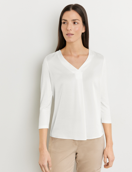 Blouse top with 3/4-length sleeves and fabric panelling in White 