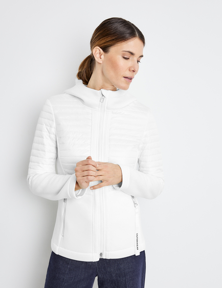 white zip up windbreaker