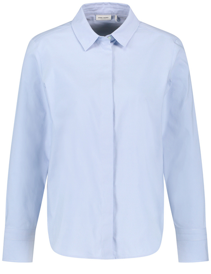 Shirt blouse with a concealed button placket and sleeve straps in