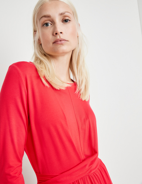 Gemustertes Jerseykleid mit Wickeloptik