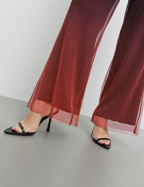 Pleated trousers with colour graduation