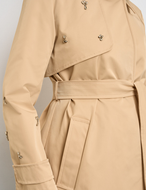 Short trench coat with rhinestone details