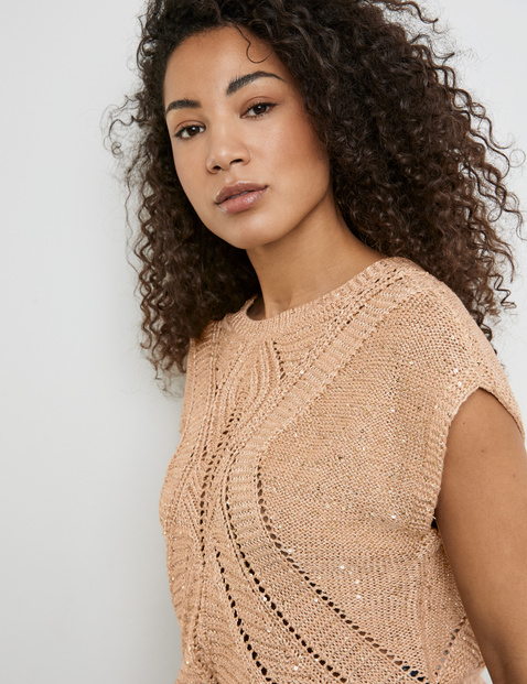 Short sleeve jumper with a sheer openwork pattern