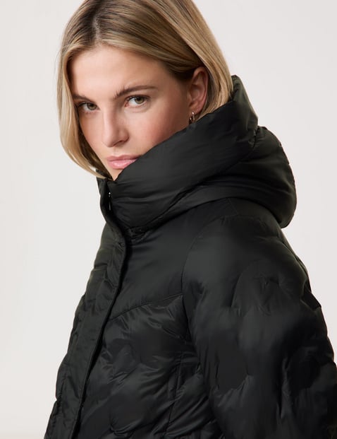 Padded light jacket with a hood