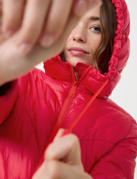 Fitted quilted jacket with a hood