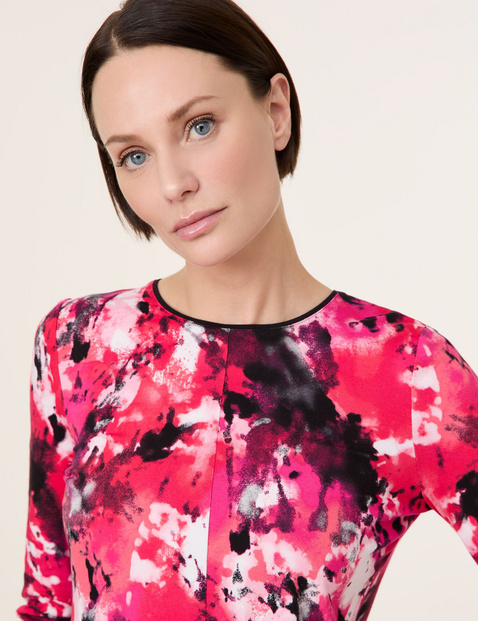 Long sleeve top with an abstract print