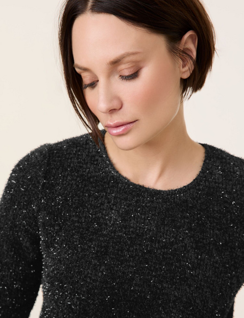 Top with mid-length sleeves and a glitter effect