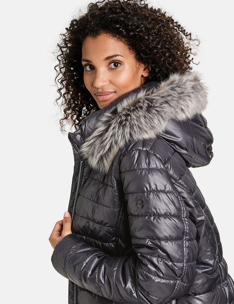 Shiny quilted jacket with faux fur