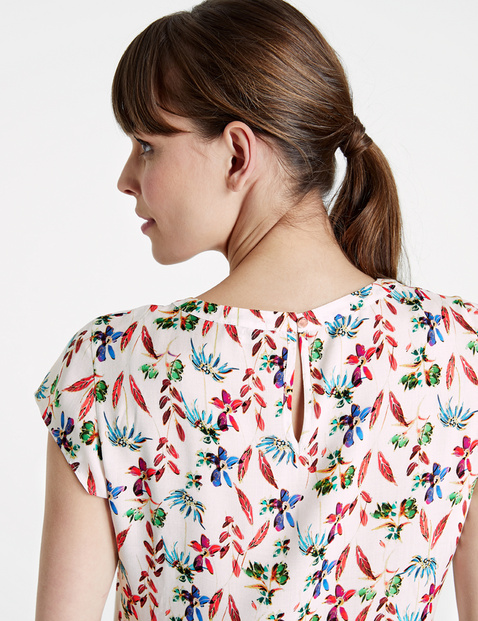 Blouse top with a floral print