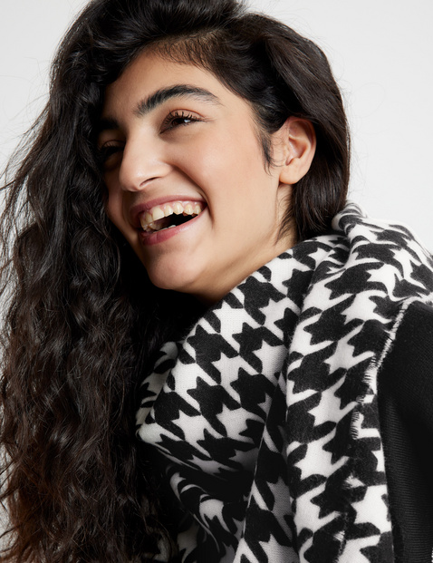 Scarf with a houndstooth pattern