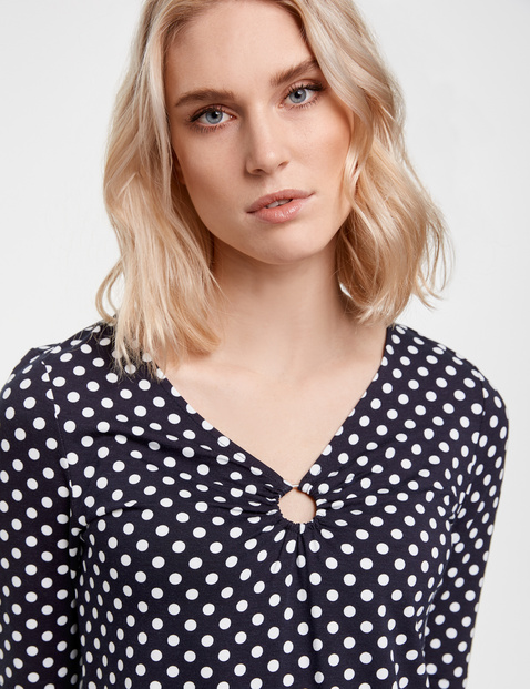 Polka dot top with mid-length sleeves