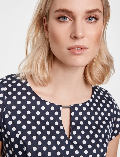 Dress with a polka dot pattern