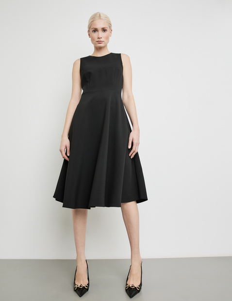 Black dress clearance with flared skirt