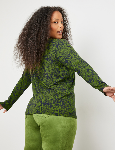 Long sleeve top with a mid-length button placket in Green | GERRY