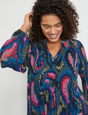 Geplisseerde blouse met uitlopend model