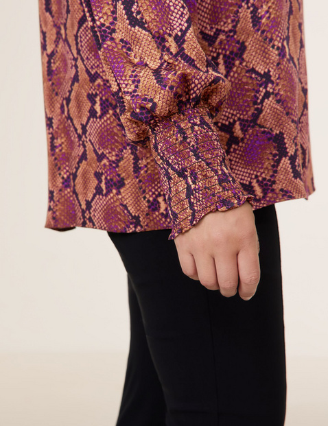 Blouse with a python print