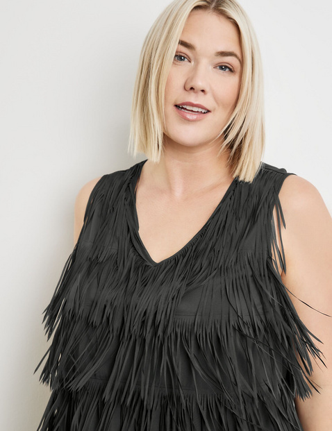 Top with fringed details