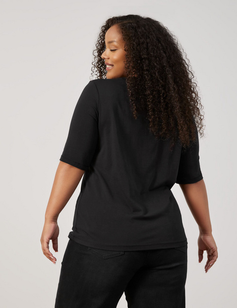 Top with mid-length sleeves and sequin embellishment