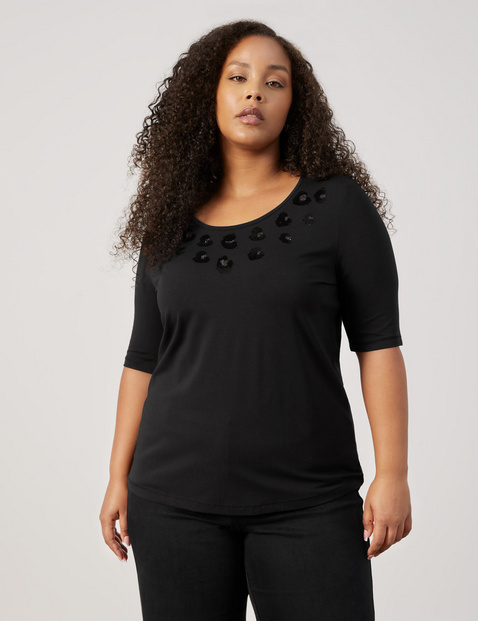 Top with mid-length sleeves and sequin embellishment