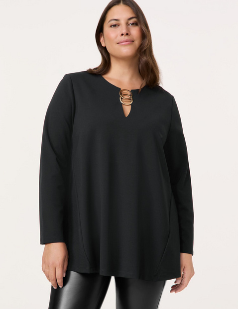 Ausgestelltes Langarmshirt mit Schmuckelement