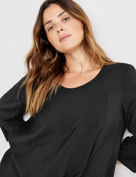 Blouse top with a knotted detail