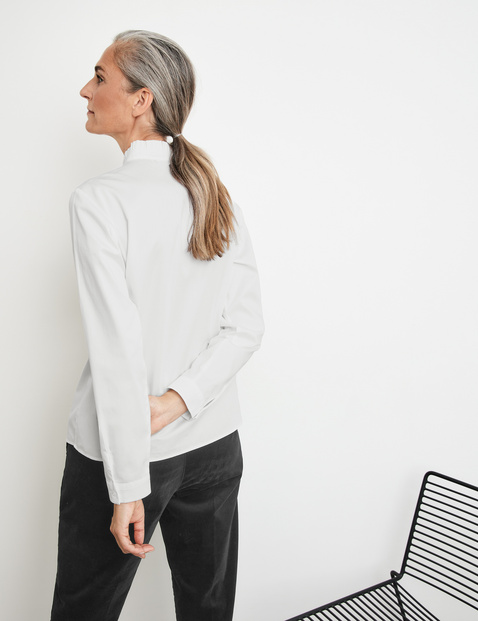 Long sleeve blouse with a gathered stand-up collar in White