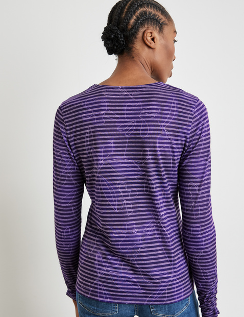 purple and white striped long sleeve shirt