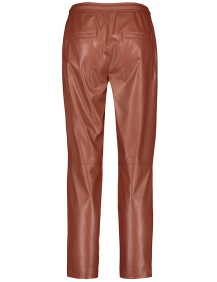 Faux leather tracksuit bottoms with an elasticated waistband in