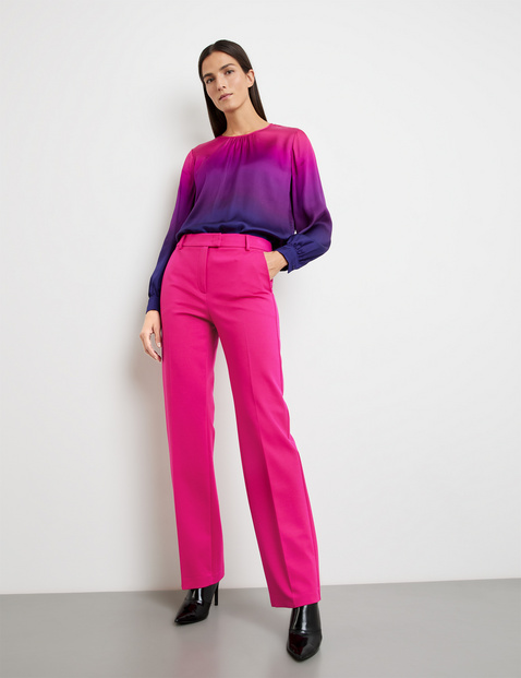 Elegant trousers with pressed pleats in Pink