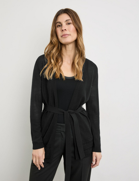 Open vest met gehaakte details en strikceintuur