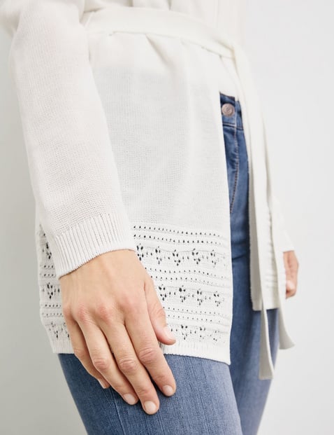 Open cardigan with crocheted details and a tie-around belt