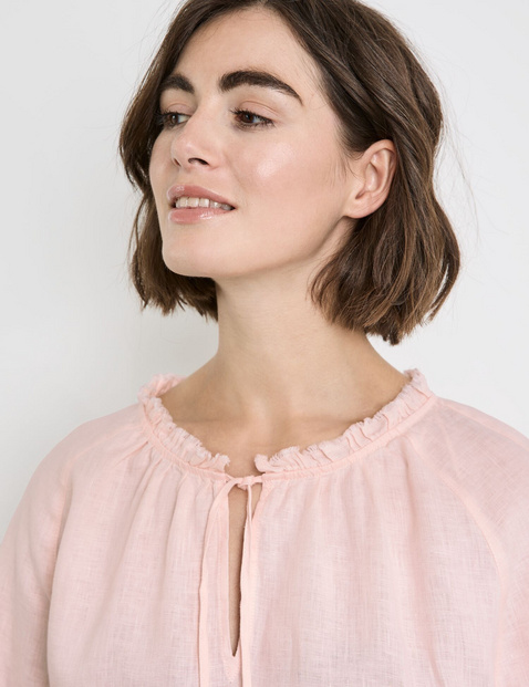 Blouse with 3/4-length sleeves and a frilled collar