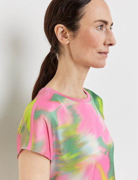 Short sleeve top with fabric panelling