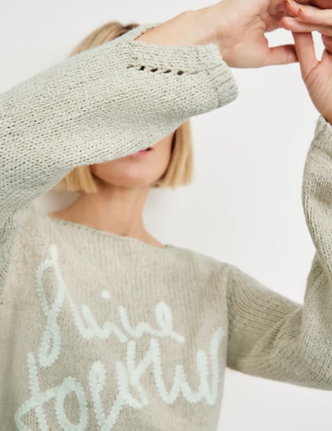 Knitted jumper with lettering