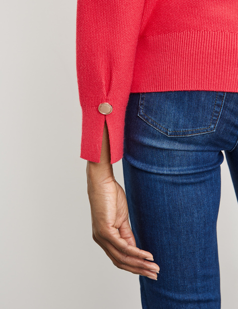 Textured knit jumper with button-fastening sleeve vents