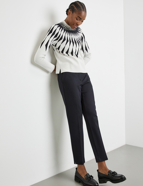 Jacquard knit jumper with a stand-up collar in White