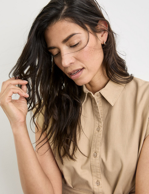 Blouse dress with a waist belt