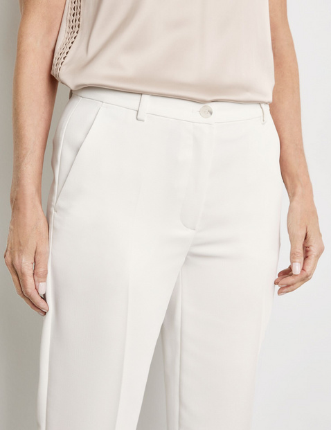 Elegant trousers with pressed pleats