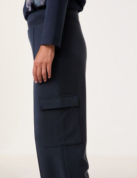 Sand-washed pull-on trousers with a cargo pocket