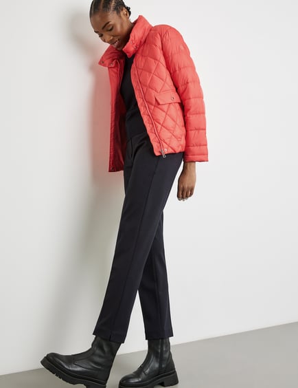 Quilted jacket with a stand-up collar and patch pockets in Red 