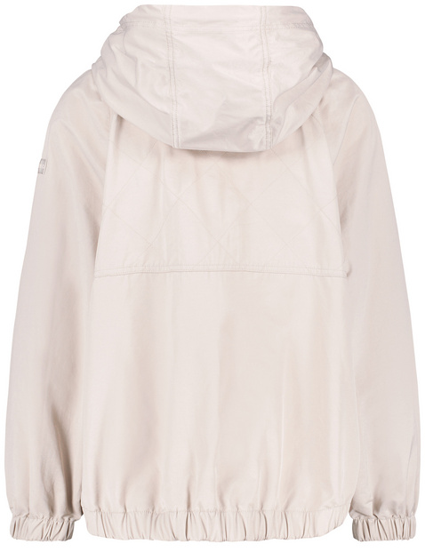 Outdoor jacket with an elasticated waistband in Beige