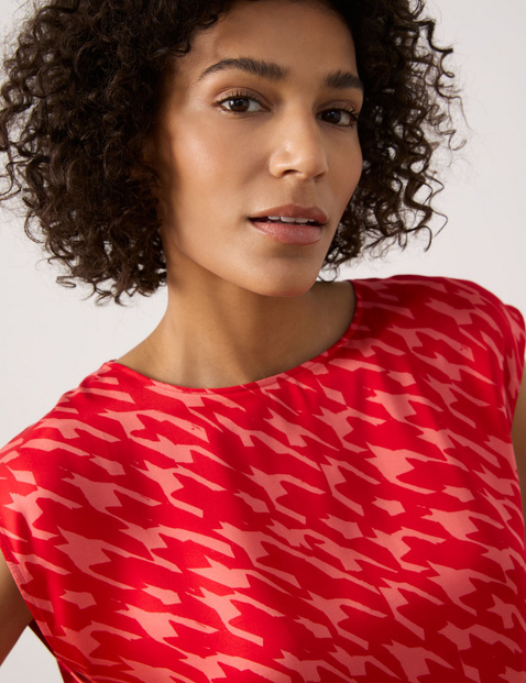 Sustainable blouse top with an all-over pattern