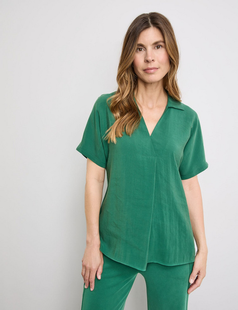 Flowing blouse with mid-length sleeves and box pleat in Green | GERRY WEBER