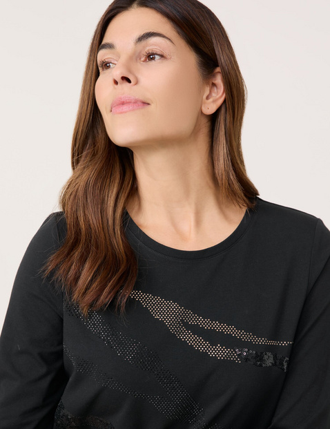 3/4-sleeve top with a decorative front