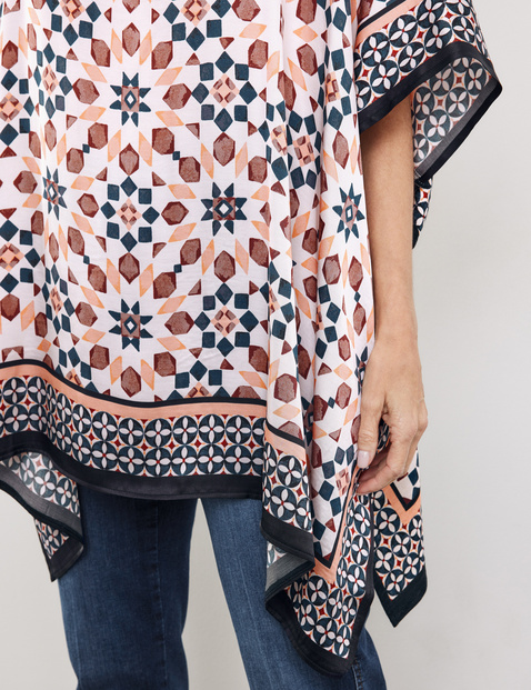 Jersey poncho met motief