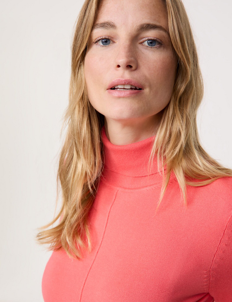 Polo neck jumper with sleeve vents