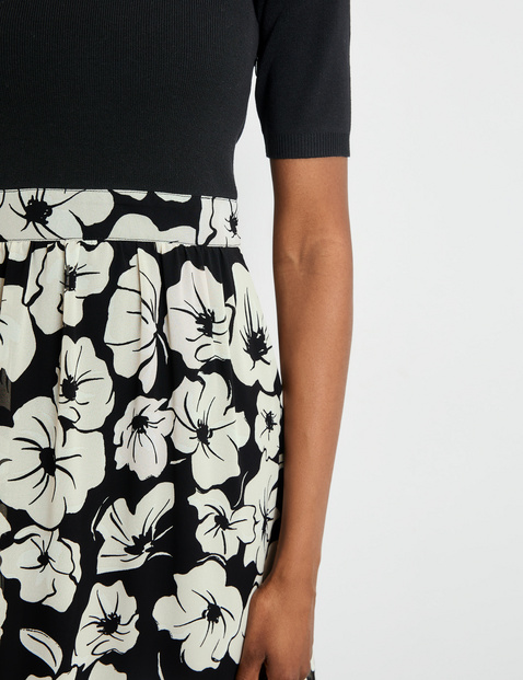 Dress with a floral skirt section