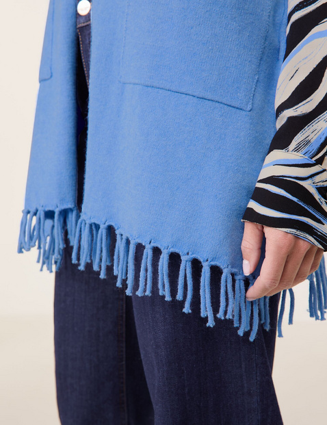 Zachte cape met franjes