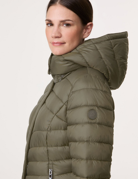 Quilted jacket with a detachable hood